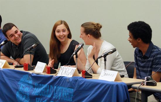The Freehold Township High School consumer team confer with each other enroute to their 2012 Central Jersey Regional title. Pictured are Casey Moore, Samantha Fitzgerald, Morgan Thompson and Jahred Liddie.